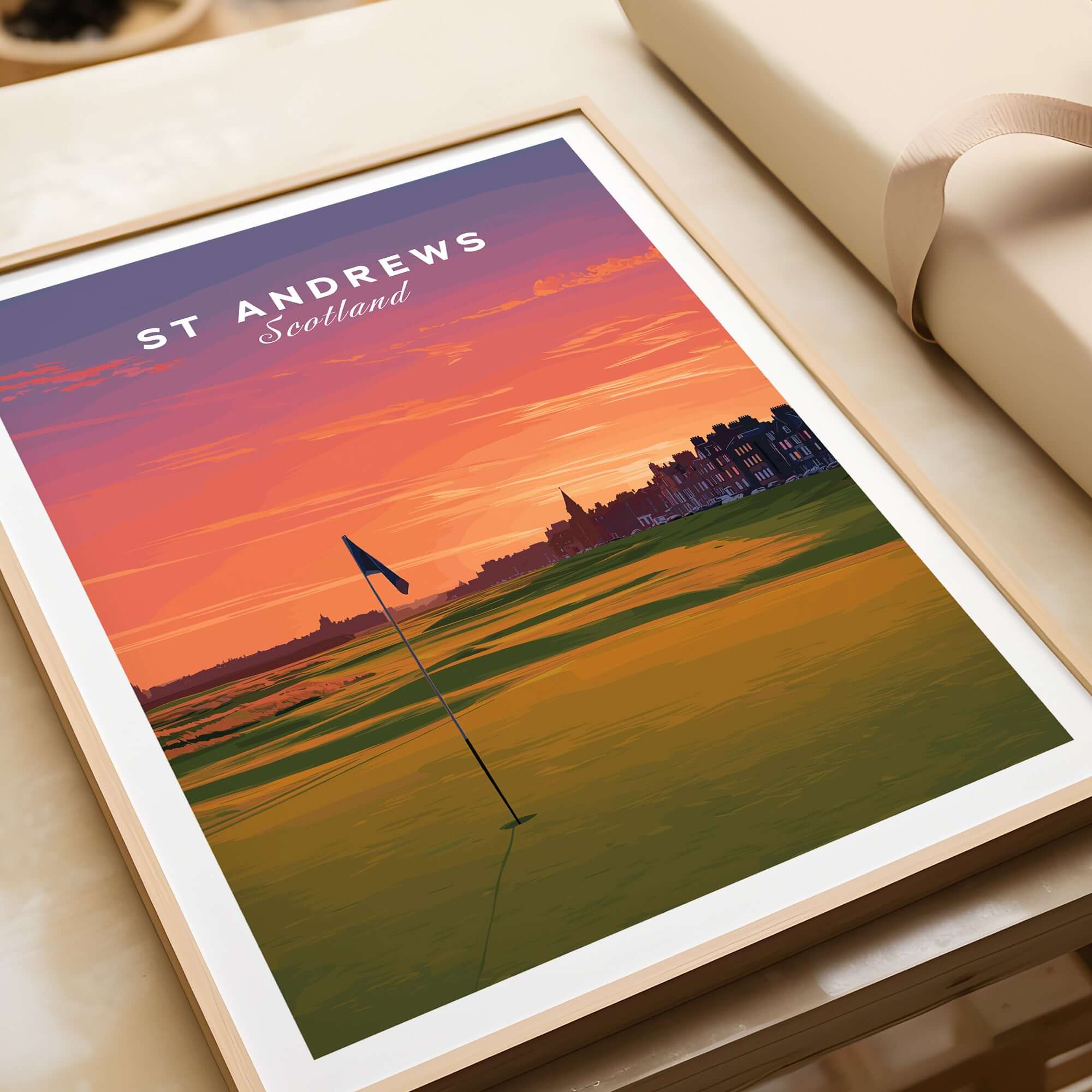 Framed print of St Andrews golf course in Scotland at sunset, showcasing iconic landscapes and rich golf history.