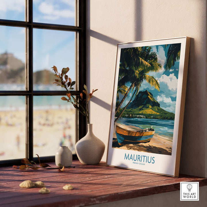Mauritius travel poster featuring a tropical boat scene, displayed indoors by a sunny window.