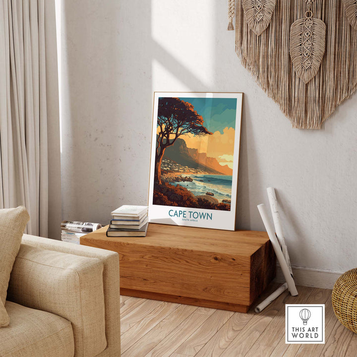 Cape Town poster featuring serene Camps Bay, styled in a cozy living room setting with natural decor elements.