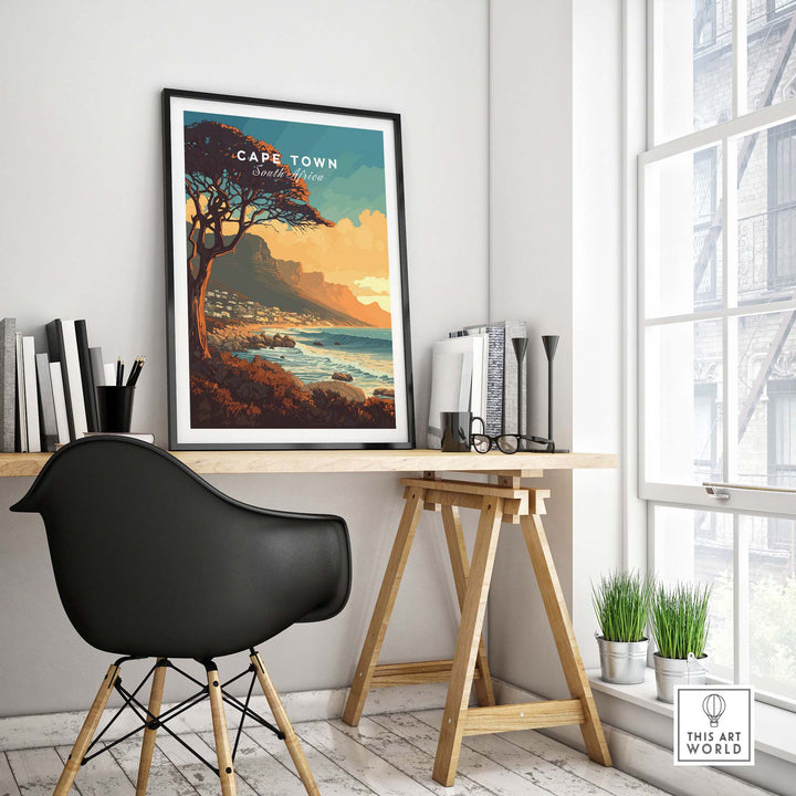 Cape Town print displayed in a modern home office, featuring Camps Bay landscape and elegant decor.