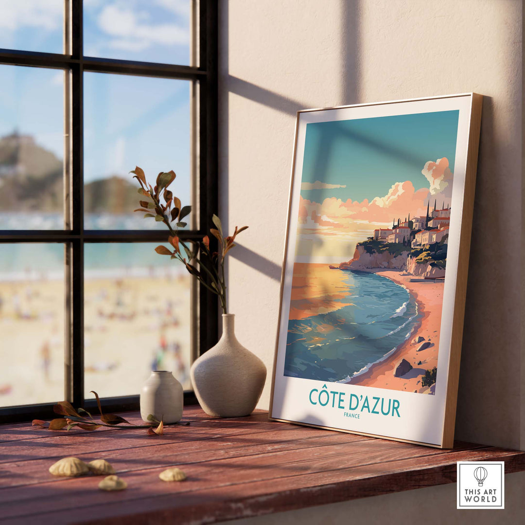 Côte d'Azur wall art displayed on a table, showcasing vibrant French coast scenery, perfect for travel lovers.