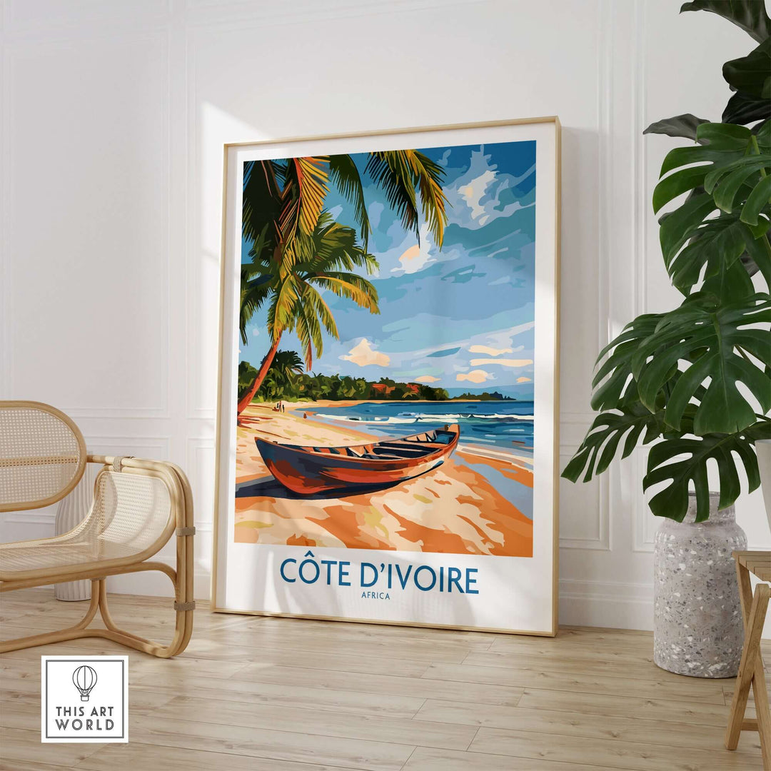 Framed Côte d'Ivoire travel print showcasing a vibrant beach scene with palm trees and a boat, perfect for home decor.