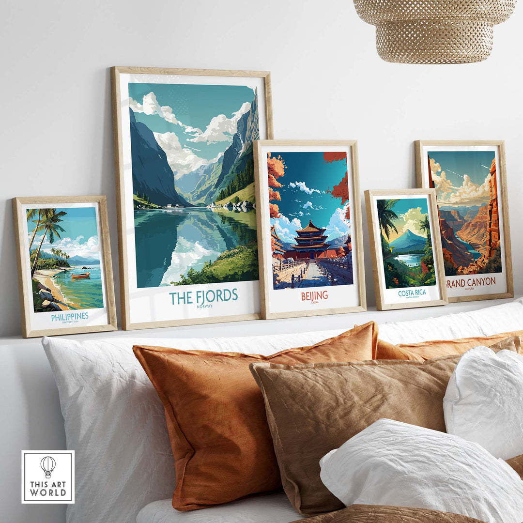 Colorful framed wall art featuring The Fjords, alongside prints of the Philippines, Beijing, Costa Rica, and the Grand Canyon.