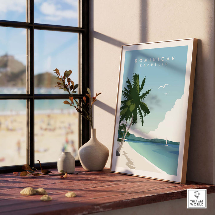 Vibrant Dominican Republic travel poster print on a wooden table, featuring a beach and palm trees, perfect for home decor.