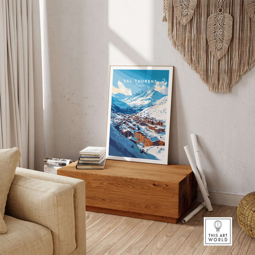 Val Thorens ski village poster in a cozy living room setting, showcasing snow-covered mountains and charming wooden cabins.
