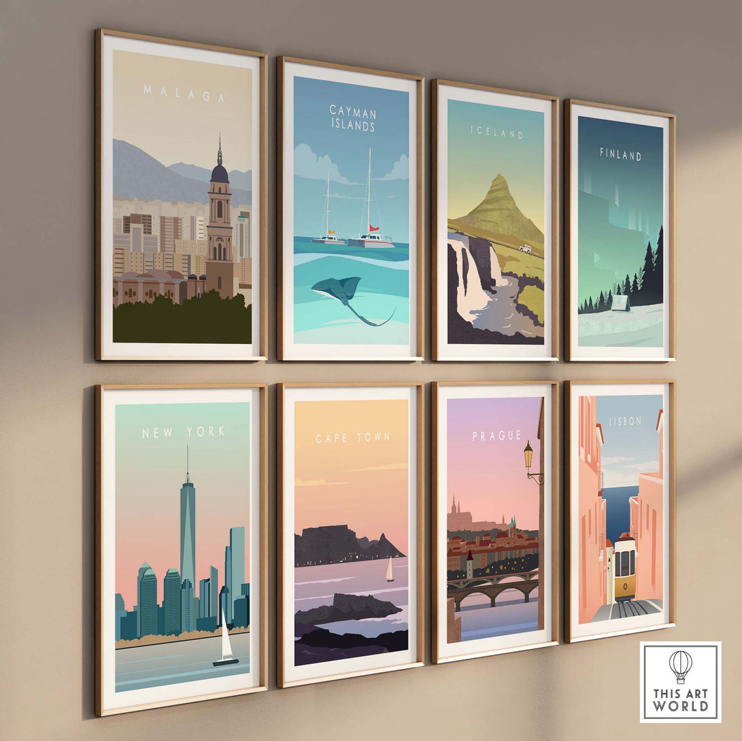 Gallery wall featuring minimalist travel poster prints of Malaga, New York, Cape Town, Prague, Iceland, and Finland.