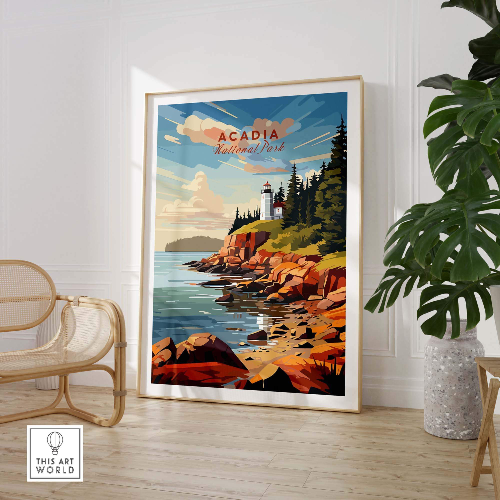Acadia National Park Poster featuring the lighthouse at sunset, framed in natural wood frame next to a chair