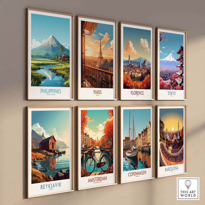 Gallery wall featuring travel posters of the Philippines, Paris, Florence, Tokyo, Reykjavik, Amsterdam, Copenhagen, and Barcelona.