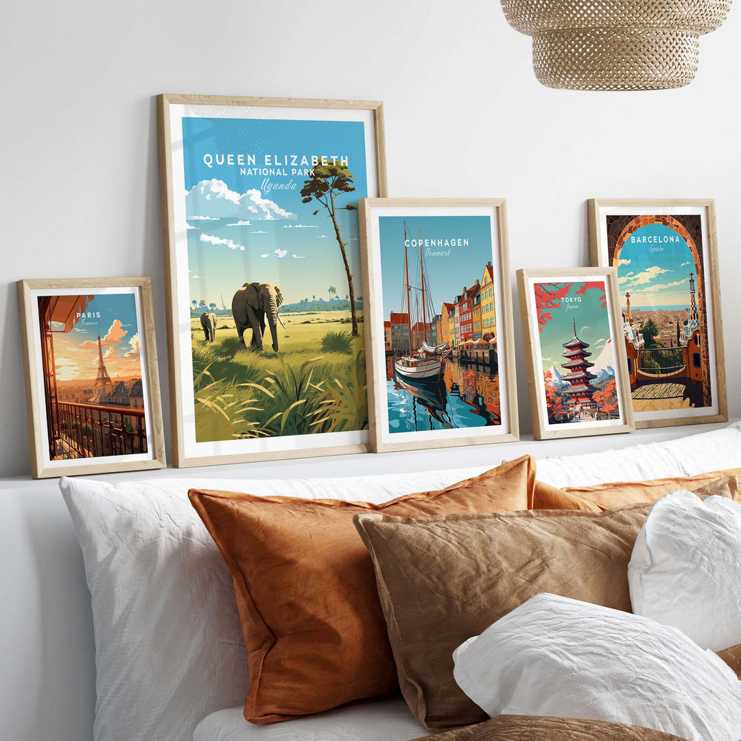 Framed Queen Elizabeth National Park poster showcasing wildlife and travel inspiration in a stylish interior decor setting.