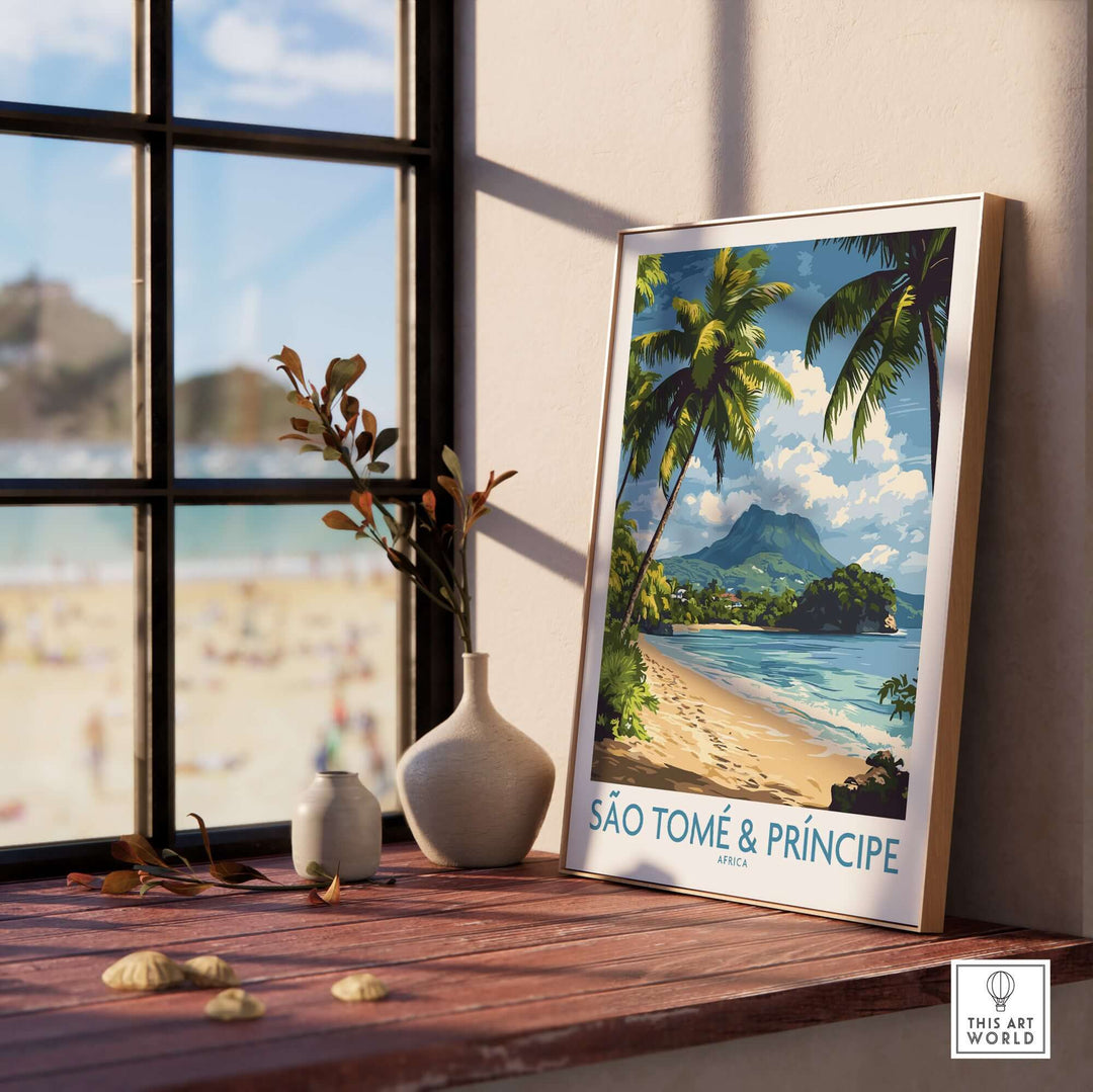 São Tomé & Príncipe Beach Travel Art Print displayed near a window with a view of a beautiful beach.