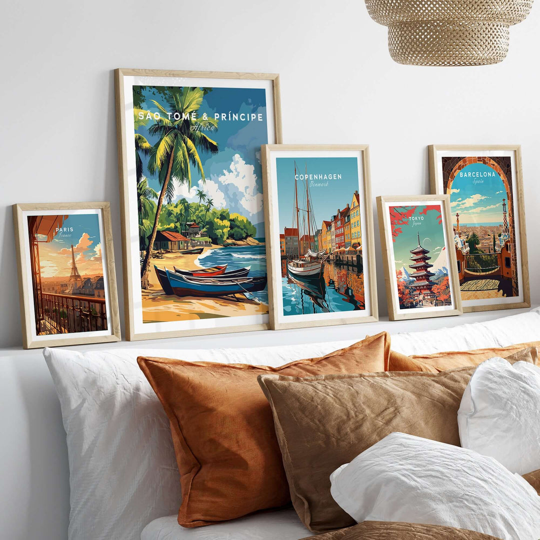 Framed São Tomé and Príncipe poster among other city posters on a stylish bed backdrop, showcasing tropical bliss.