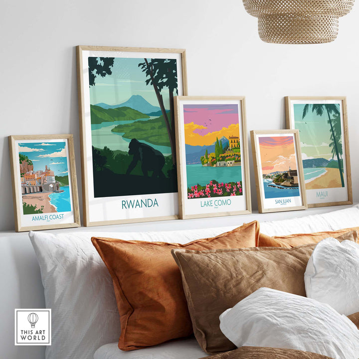 Rwanda Mountain Gorilla wall art print displayed among scenic travel posters in a stylish home setting.