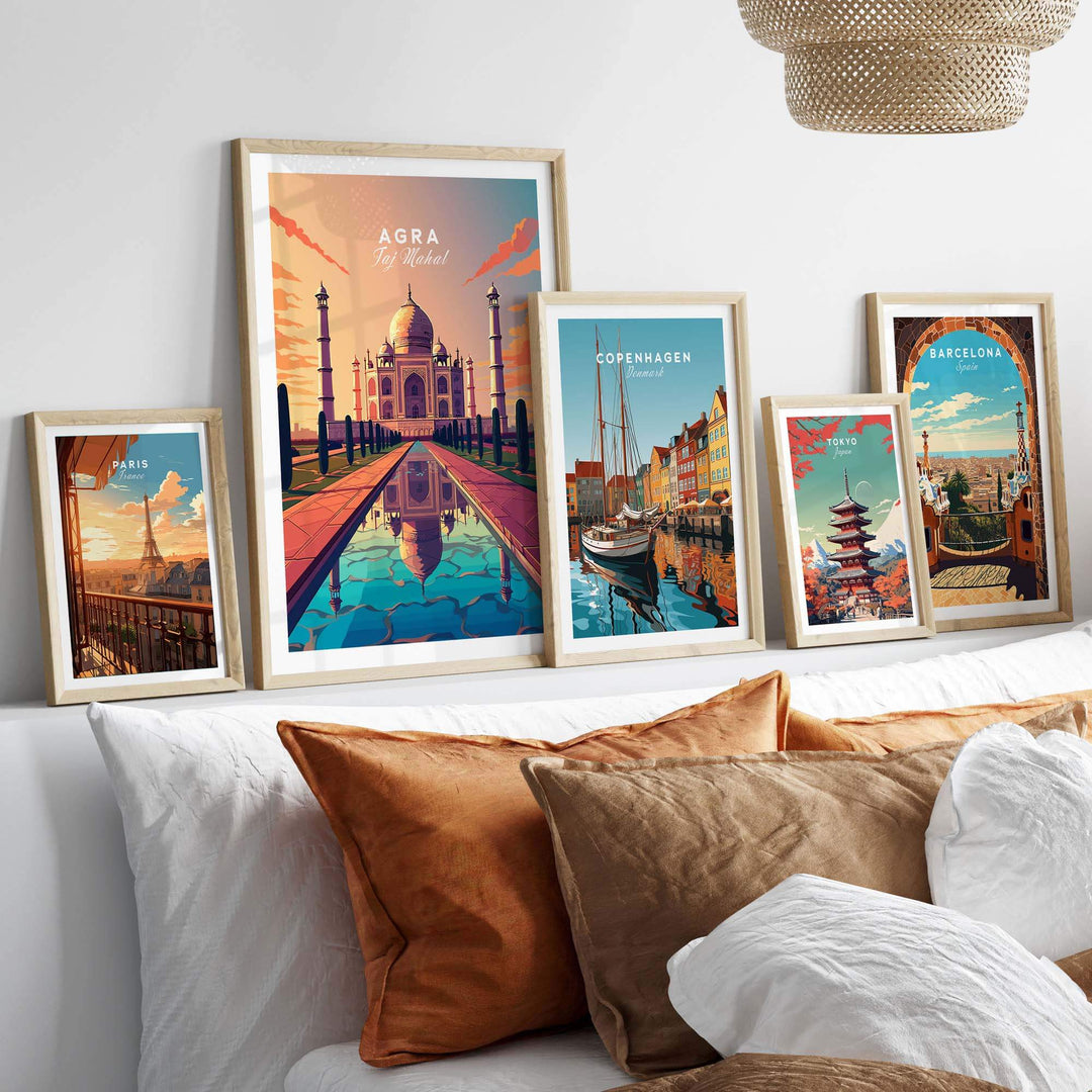 Framed Taj Mahal wall art alongside travel prints of Copenhagen and Barcelona, enhancing home decor with vibrant colors.