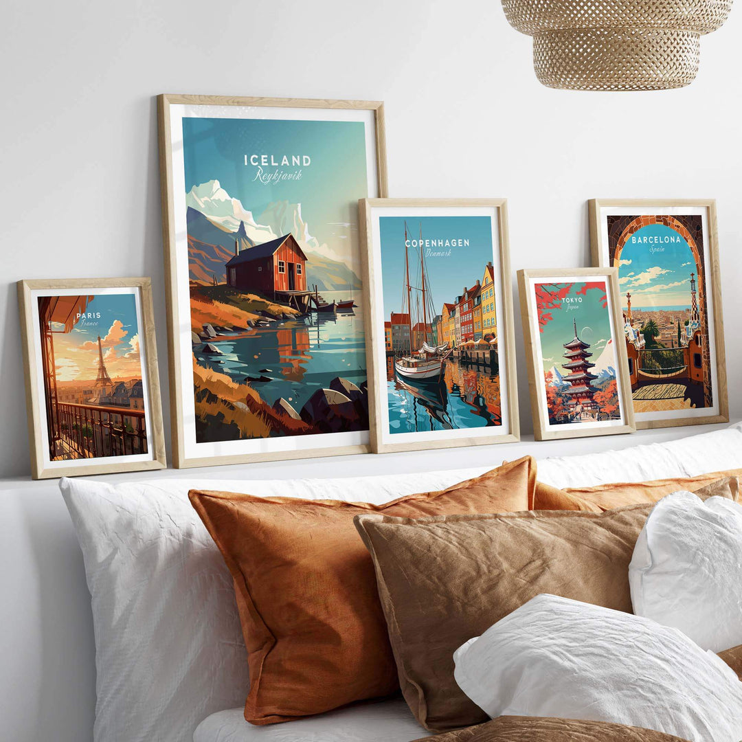 Iceland Poster Reykjavik among other travel posters, stylishly displayed on a cozy wall above decorative cushions.