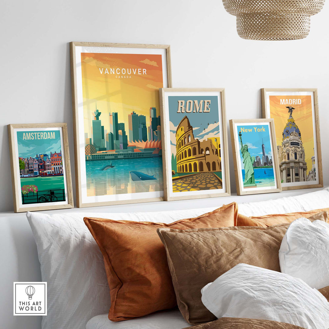 Vibrant travel poster prints of Vancouver, Rome, Amsterdam, New York, and Madrid displayed in a cozy home setting.