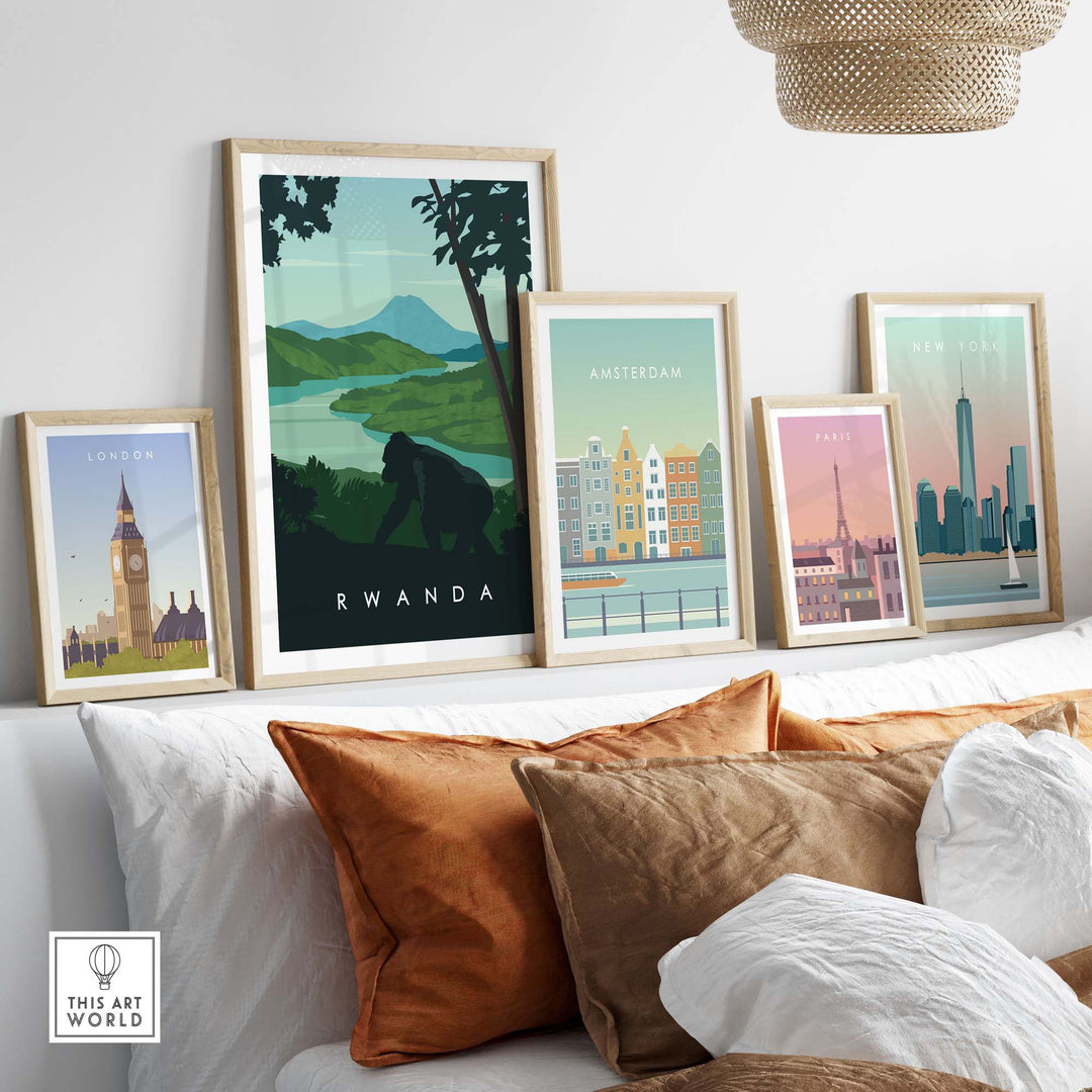 Rwanda travel poster print featuring mountain gorillas, displayed among other city art prints in a cozy living room setting.