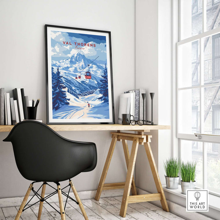 Val Thorens ski art print framed on a wall, showcasing a winter sports scene in the French Alps.