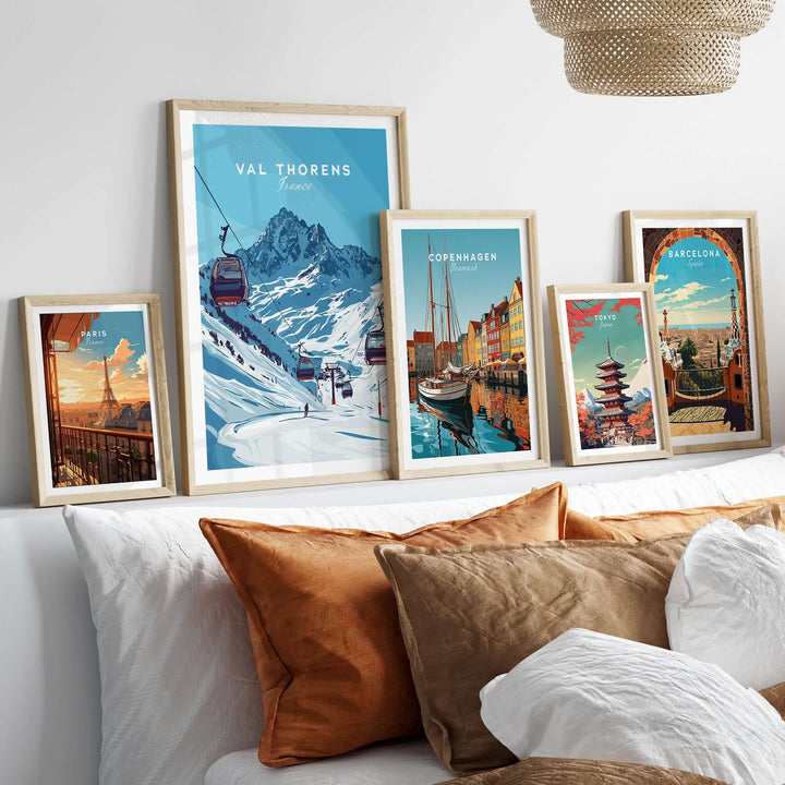 Val Thorens ski art print displayed on a wall with framed artwork showcasing winter sports in the French Alps.