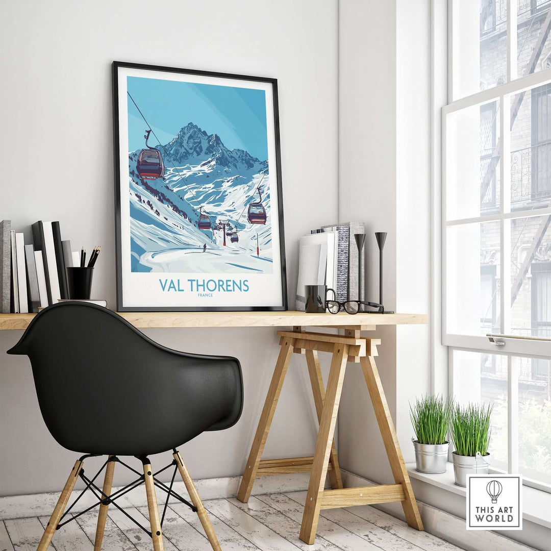 Val Thorens ski resort poster displayed in a modern home office, featuring snowy mountains and ski lifts.
