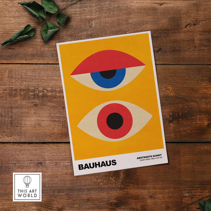 Bauhaus abstract eyes poster with geometric shapes in orange, red, and blue on a yellow background.