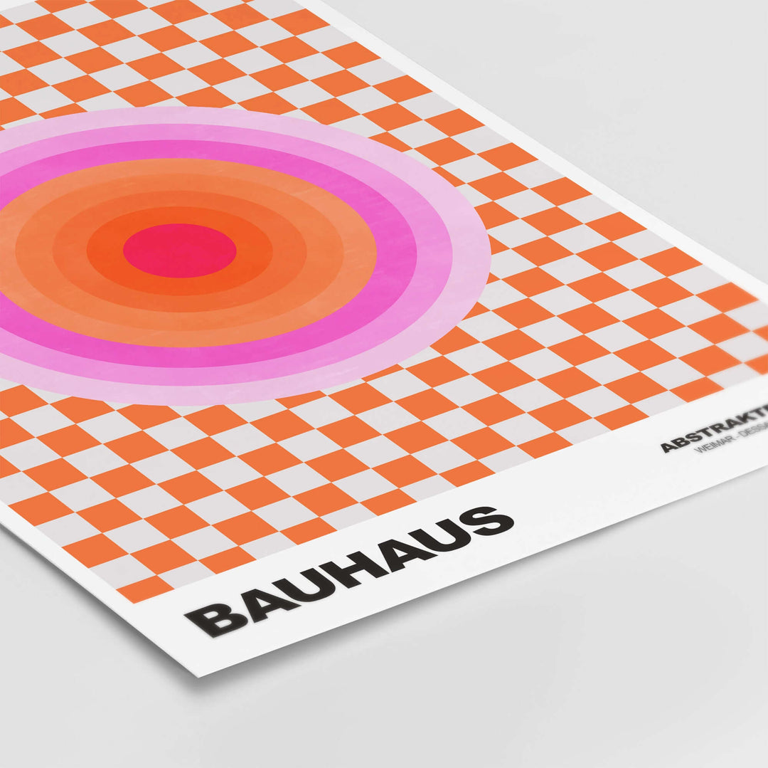 Bauhaus exhibition print featuring pink circles on an orange and white checkerboard background.