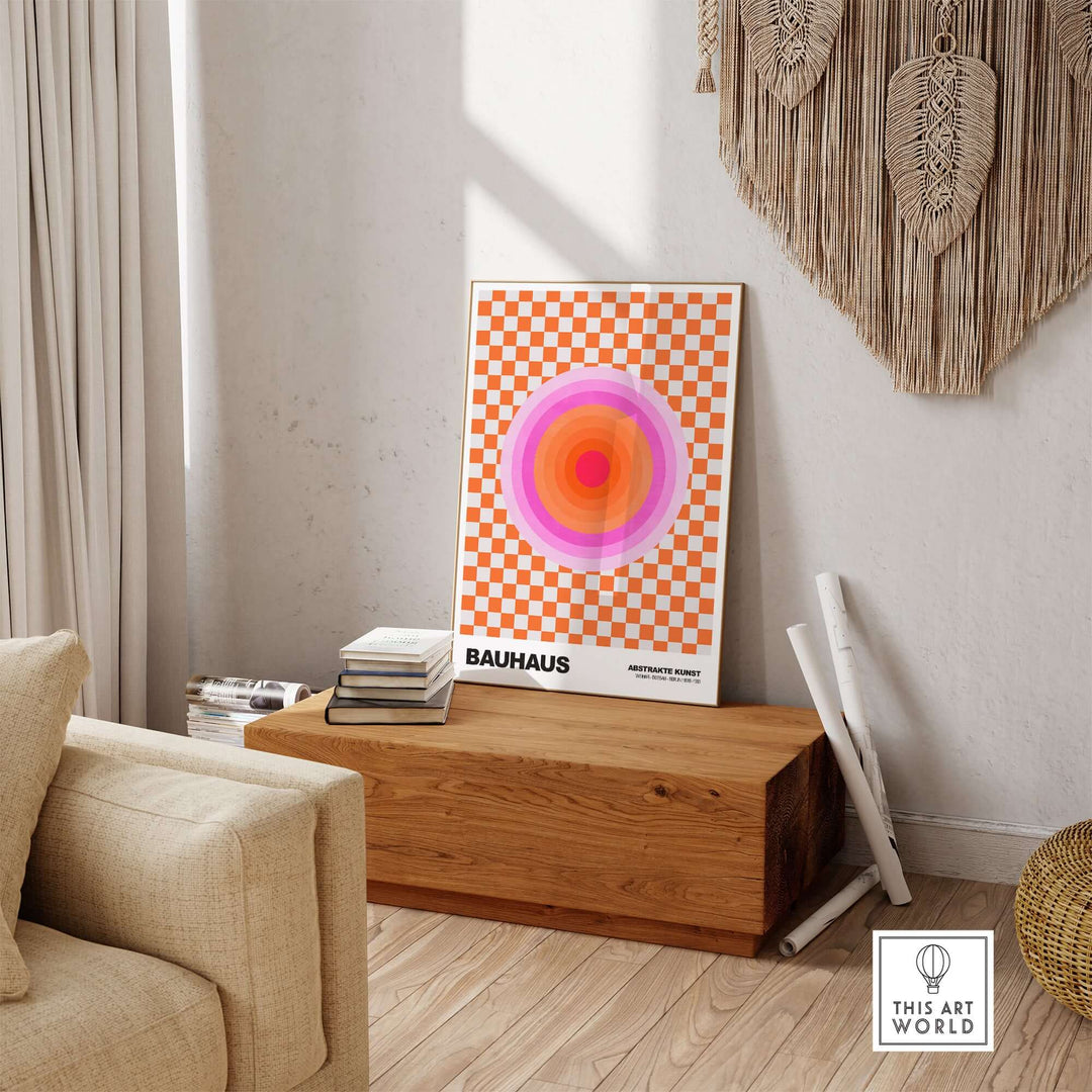 Bauhaus art print featuring pink circles and orange checkerboard in a stylish interior setting.