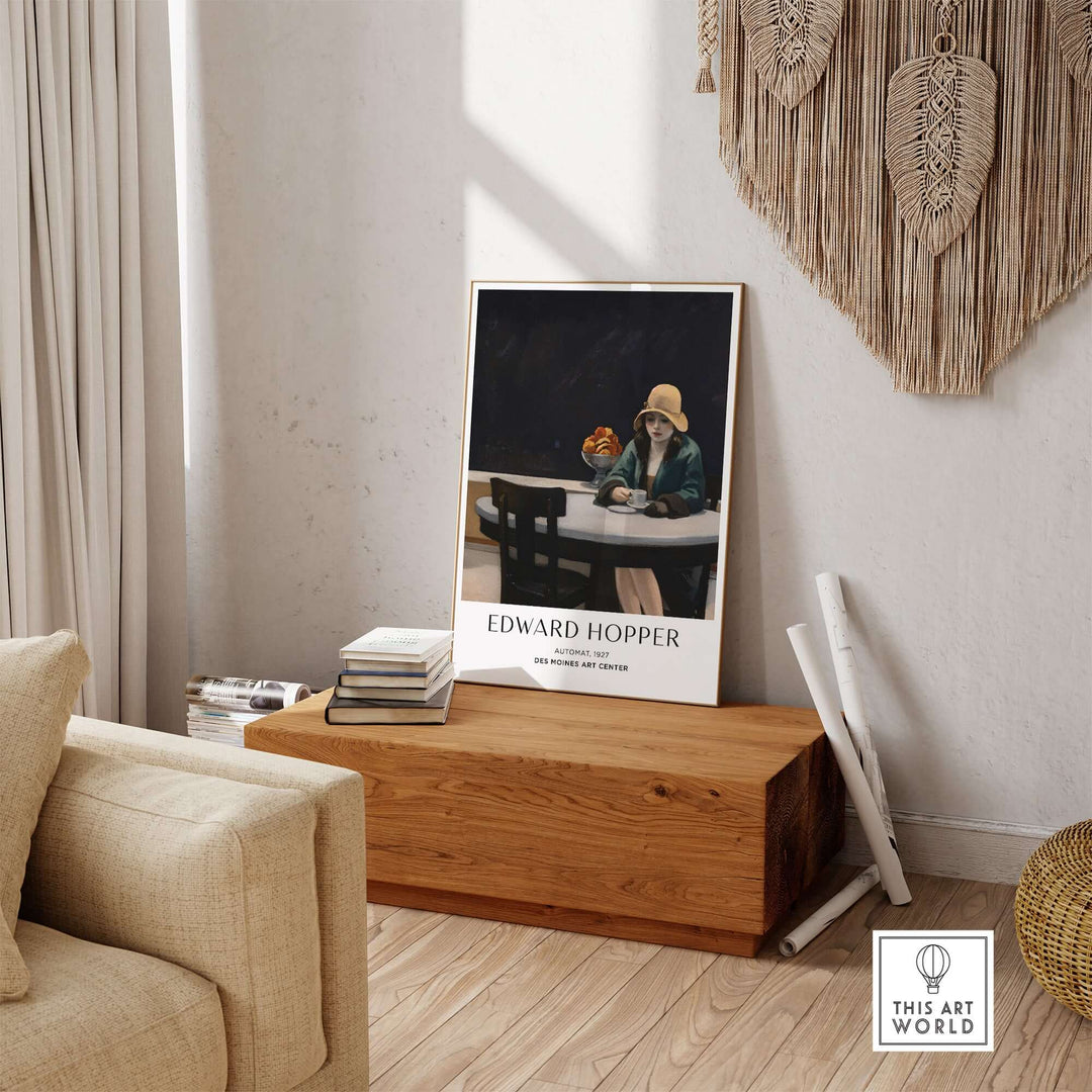 Edward Hopper 1927 Automat art print displayed in a modern living room setting on a wooden coffee table.