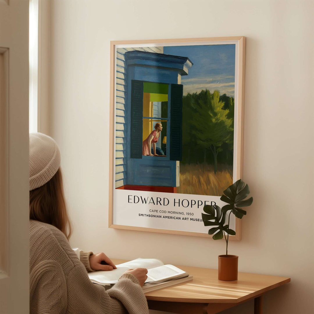 Edward Hopper Cape Cod Morning art print poster displayed in a cozy interior setting.