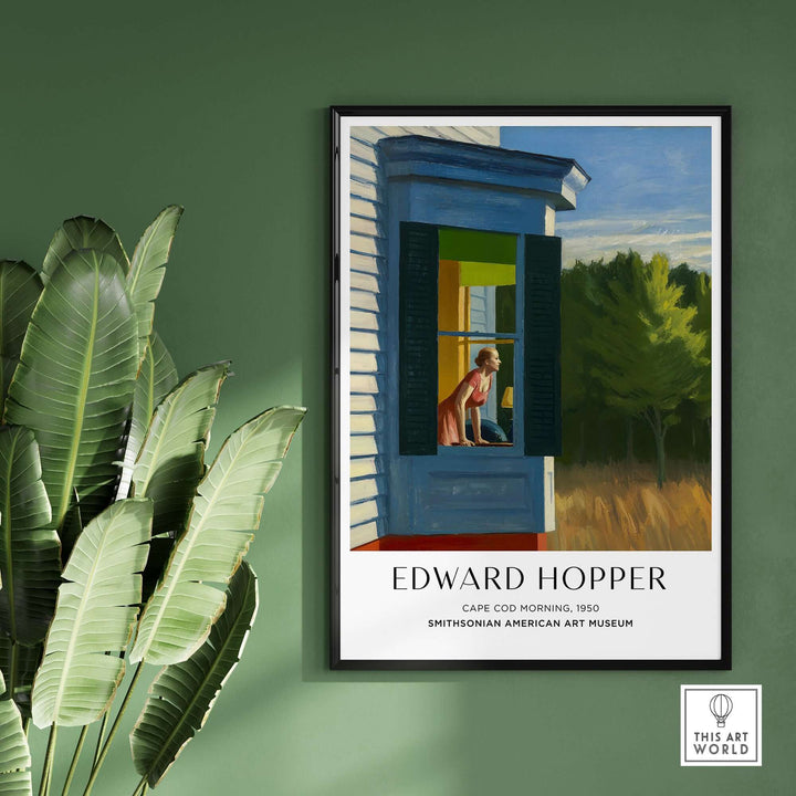Edward Hopper's Cape Cod Morning 1950 art print poster displayed on wall with green backdrop and tropical plants.