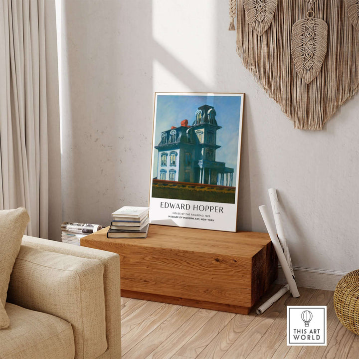 Edward Hopper House by the Railroad 1925 art print displayed in a cozy living room setting.