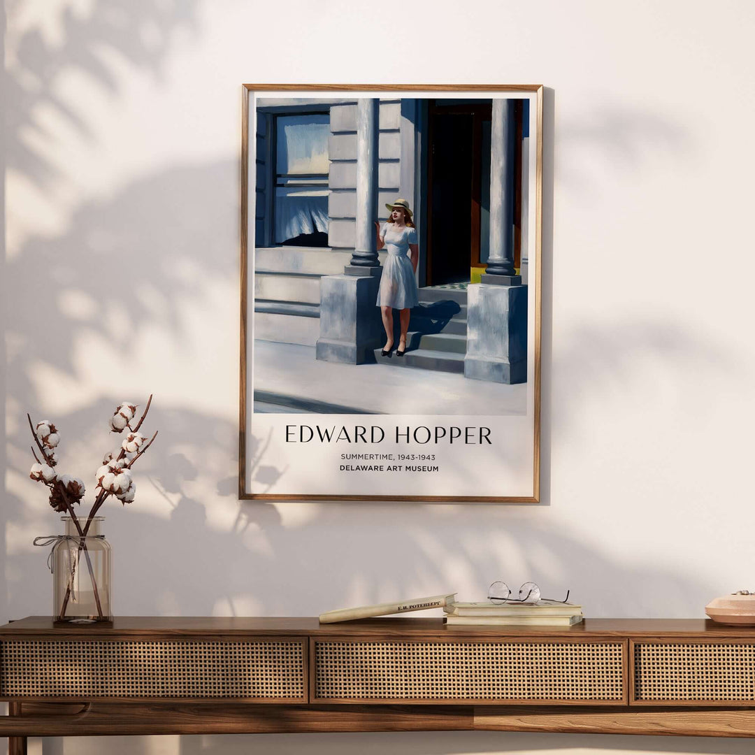 Edward Hopper Summertime 1943 art print displayed on a wall, showcasing urban life and sunlight ambiance.