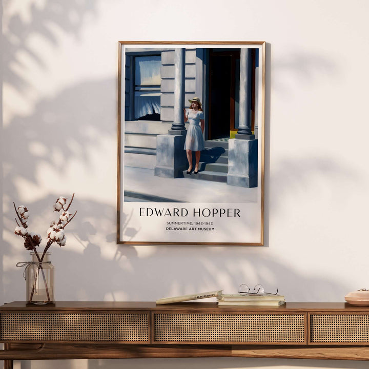 Edward Hopper Summertime 1943 art print displayed on a wall, showcasing urban life and sunlight ambiance.