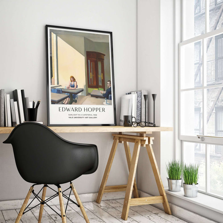 Edward Hopper Sunlight in a Cafeteria print displayed in a modern home office setting with stylish furniture.
