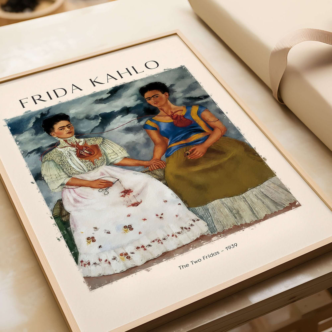 Frida Kahlo art print of 'The Two Fridas' (1939) poster depicting dual self-portrait with hearts exposed.