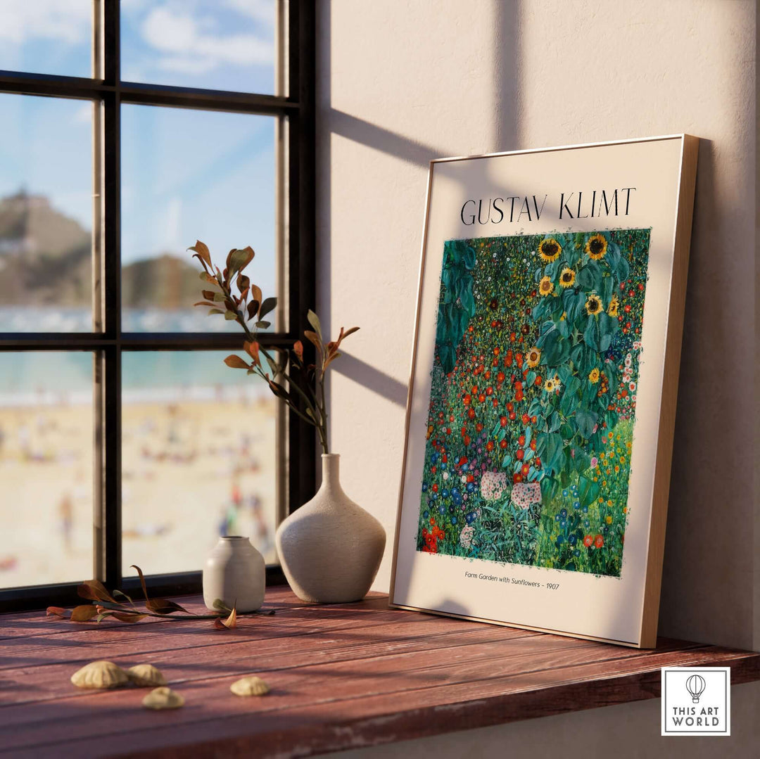 Gustav Klimt art print 'Farm Garden with Sunflowers' framed on a wooden shelf by a sunny window.