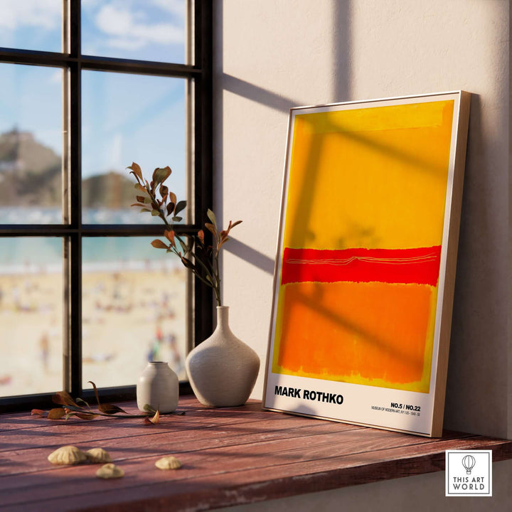Mark Rothko No. 5 No. 22 abstract expressionist print in a sunny room with a vase and beach view.