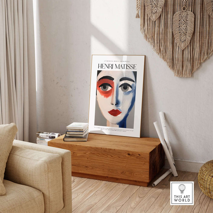 Matisse abstract portrait poster with bold colors displayed in a modern living room setting.
