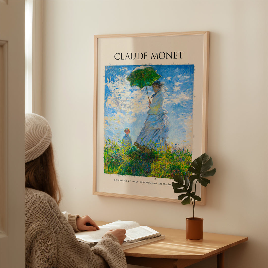 Monet Woman with Parasol art print displayed in a cozy room with a person reading.
