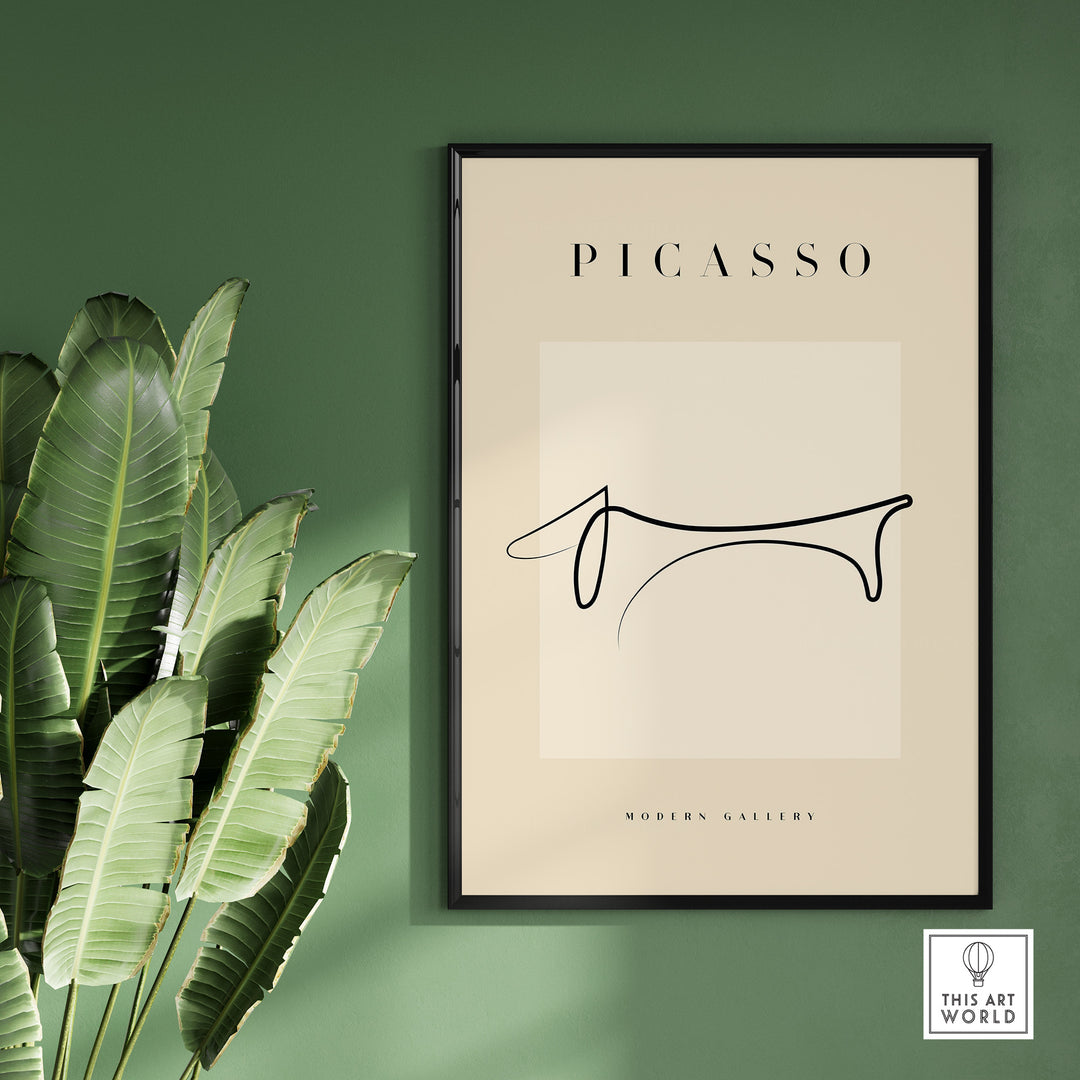 Minimalist Picasso Dachshund dog line art poster in a modern gallery setting, framed and displayed against a green wall.
