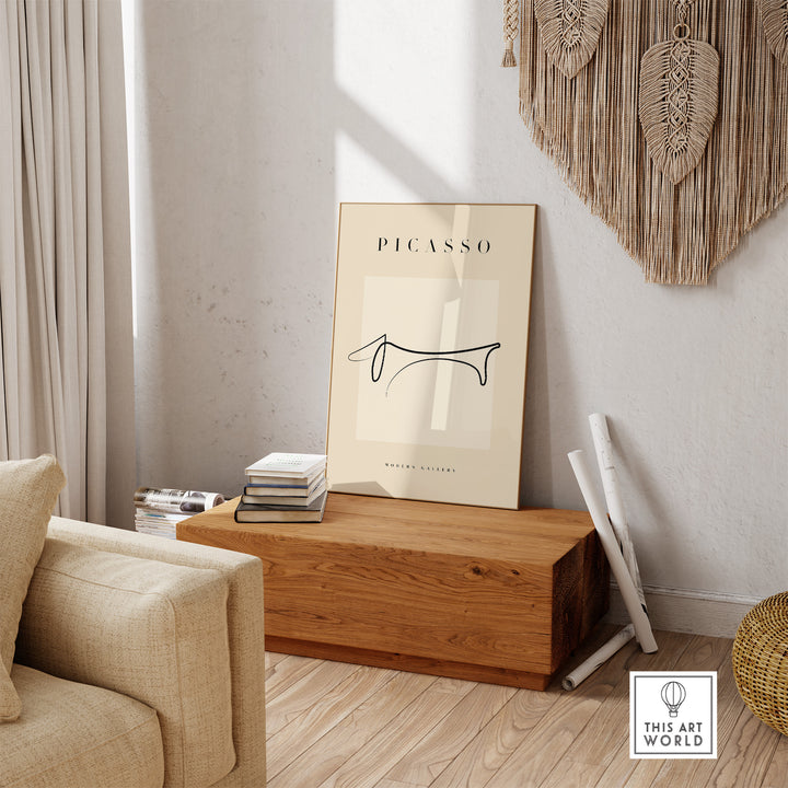 Minimalist Picasso Dachshund dog line art poster displayed in a stylish living room with natural decor.