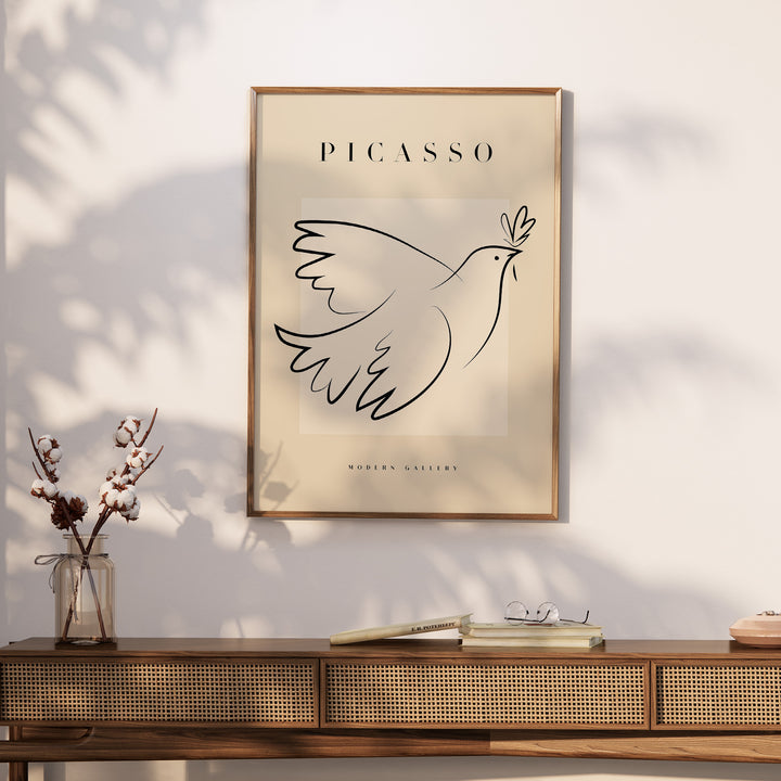 Picasso Dove of Peace line art poster with olive branch in a minimalist frame on display.
