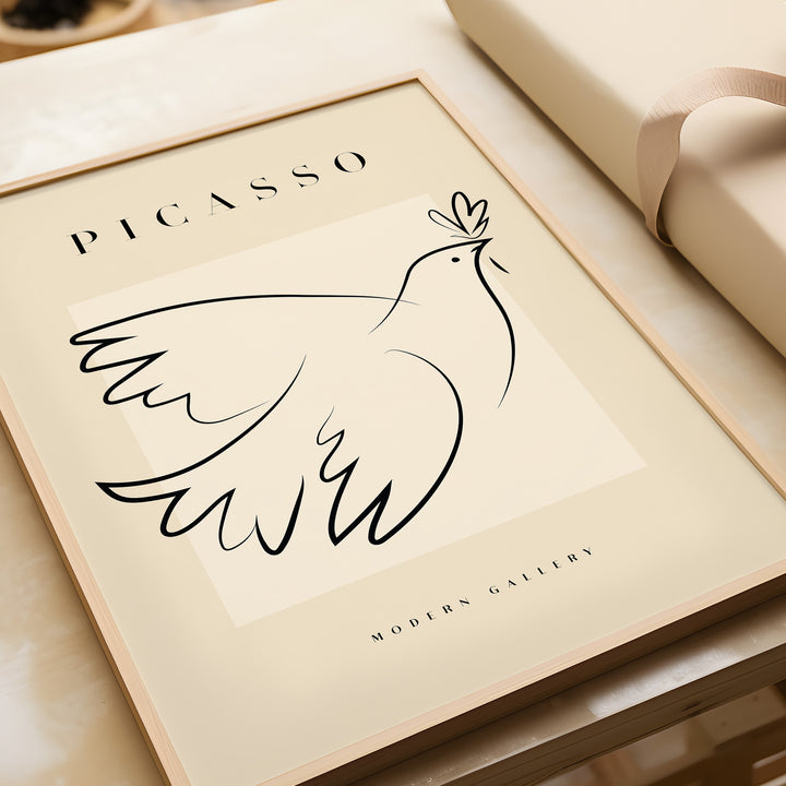 Minimalist Picasso Dove of Peace line art poster in a modern gallery frame, symbolizing peace and simplicity.