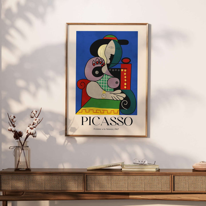 Colorful Picasso 'Femme à la Montre' 1967 art print poster framed on a modern wall, showcasing Cubist design.