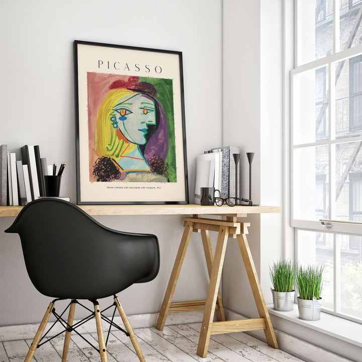 Picasso Marie-Thérèse portrait art print in modern office decor with stylish chair and plants.