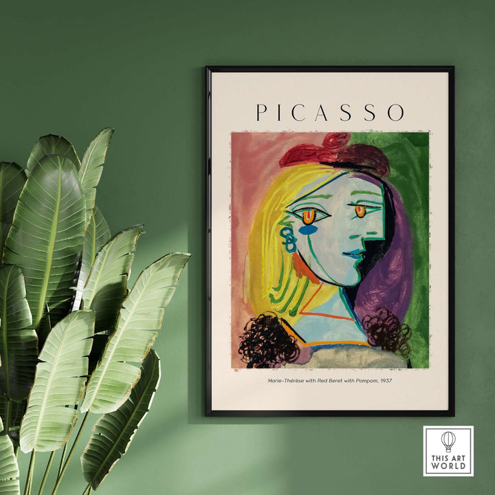 Picasso art print of Marie-Thérèse wearing a red beret with pompom, colorful cubist portrait on green wall.