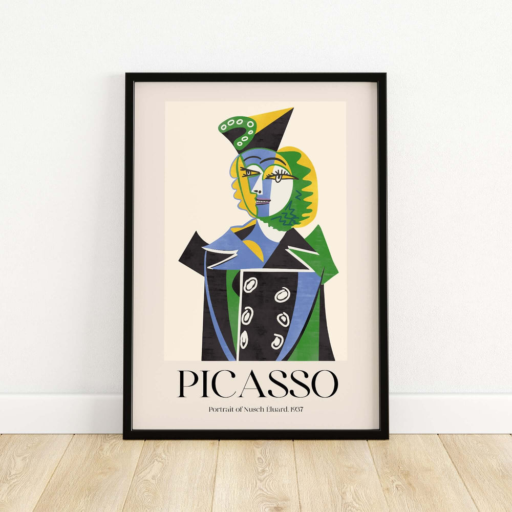 Colorful Picasso cubist art print of Nusch Eluard 1937 in a modern frame on a wooden floor.
