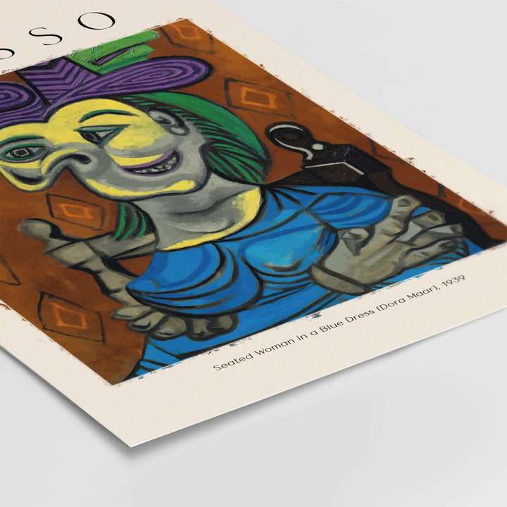Picasso Seated Woman in Blue Dress art print, cubist portrait of Dora Maar, expressive colors and abstract style, 1939.