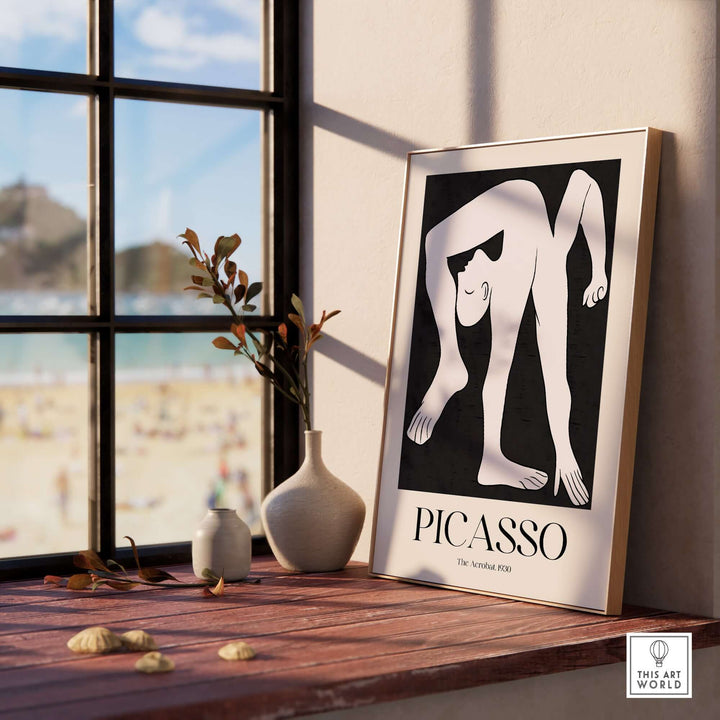 Picasso The Acrobat 1930 minimalist art print displayed in a stylish home setting with beach view.