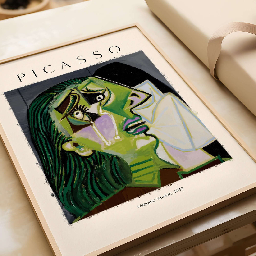 Picasso Weeping Woman 1937 art print featuring a distorted face and vivid colors, showcasing emotional expression in Cubism.
