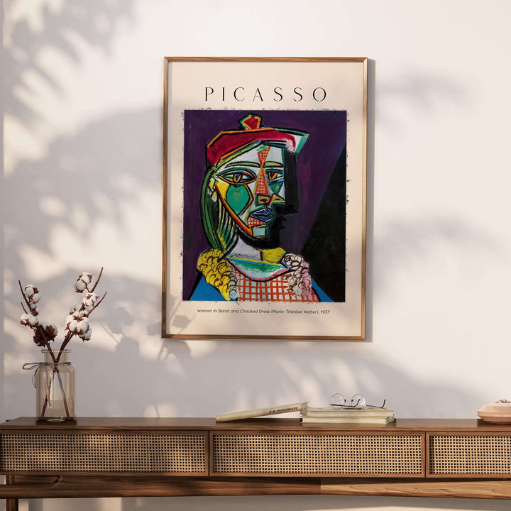 Picasso 1937 Cubist portrait poster of Marie-Thérèse wearing a red beret and checked dress, vibrant colors.